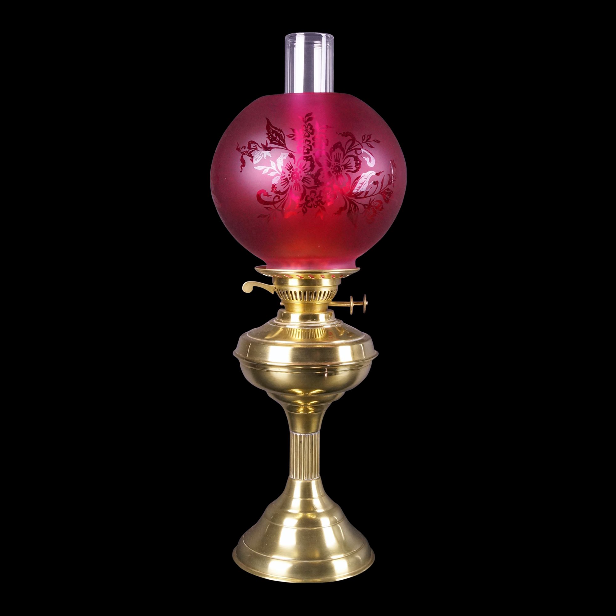 A Cranberry Glass Hand Oil Lamp with Kosmos Burner & Chimney Old